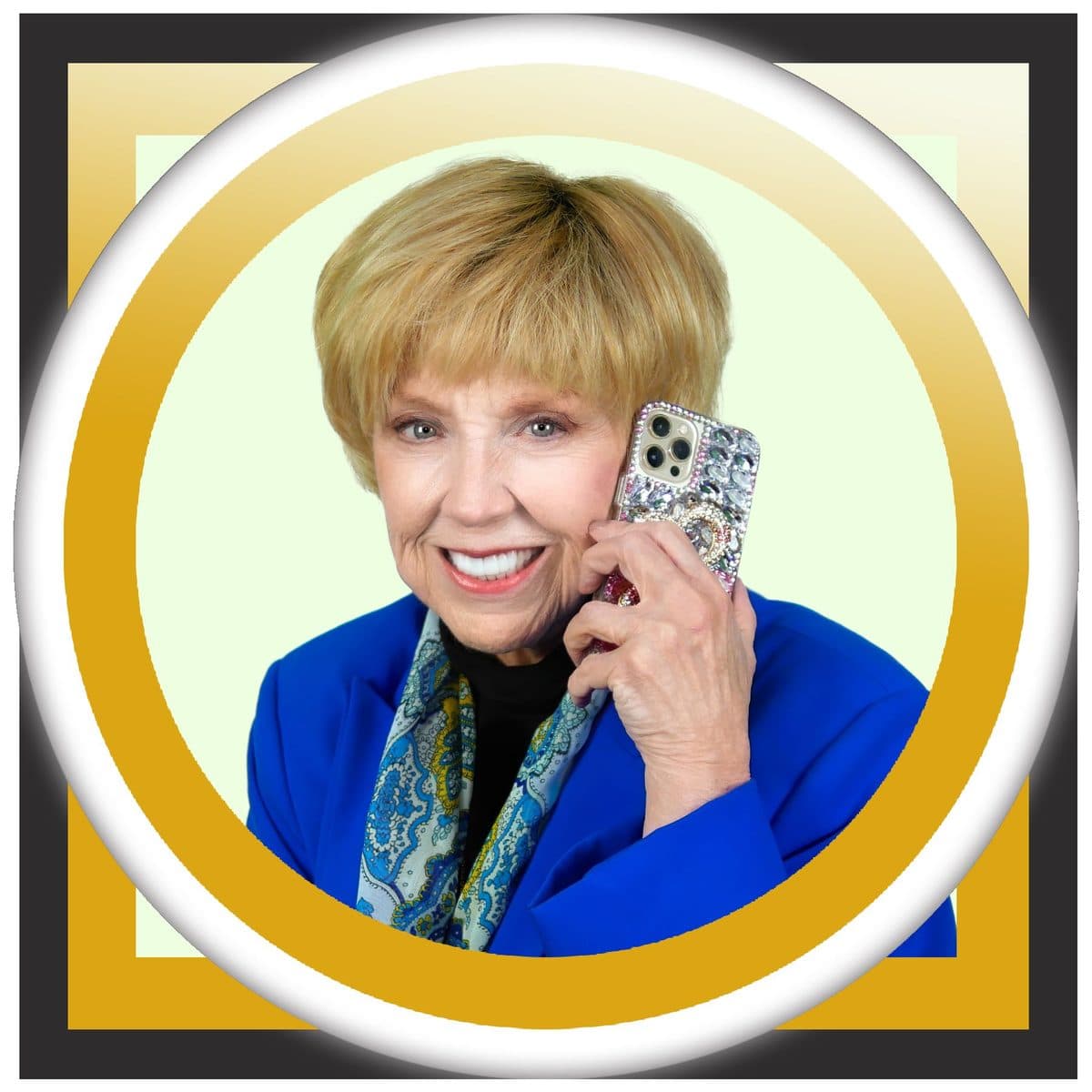 Dr. Jan Duffy, Las Vegas REALTOR, smiling on a phone call in a royal blue blazer, photographed for a Las Vegas home search in Las Vegas, Nevada. Shown as the main portrait on the page.